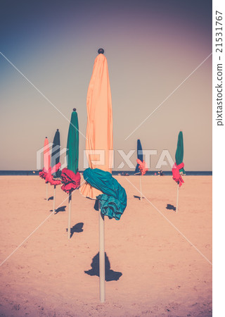 The famous colorful parasols on Deauville beach 21531767