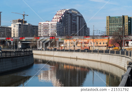 Moscow - River Yauza passing train and new 21531792
