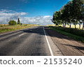 the country highway with a roadside landscape 21535240