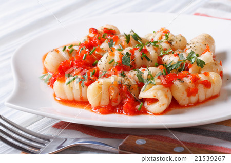 Potato gnocchi with tomato sauce, horizontal 21539267