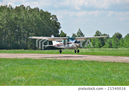 Stock Photo: Light private plane landing