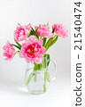 Pink tulips in a glass jar 21540474