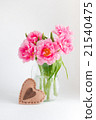 Pink tulips in a glass jar 21540475