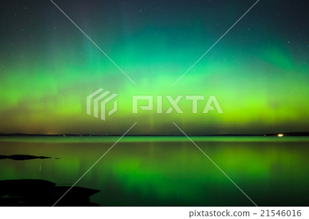 Northern lights over lake in finland Northern lights over lake in finland 21546016
