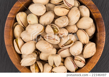 Pistachio nuts in bowl 21546497