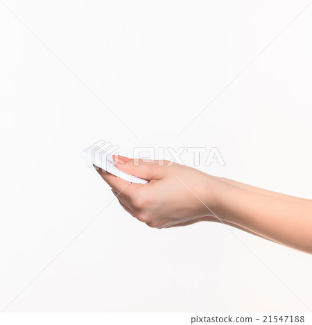 Female hand holding blank paper for records on Female hand holding blank paper for records on 21547188