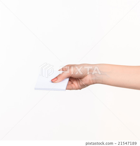 Female hand holding blank paper for records on Female hand holding blank paper for records on 21547189