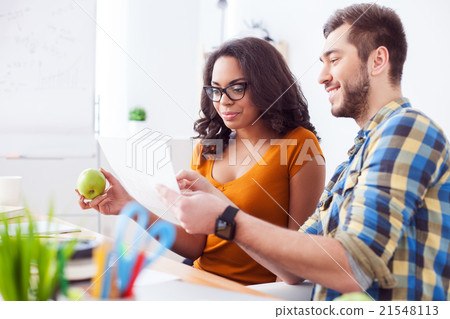 Successful creative team is discussing new project 21548113