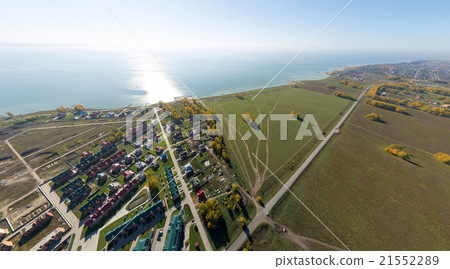 Aerial view of a summer house village at blue sea Aerial view of a summer house village at blue sea 21552289