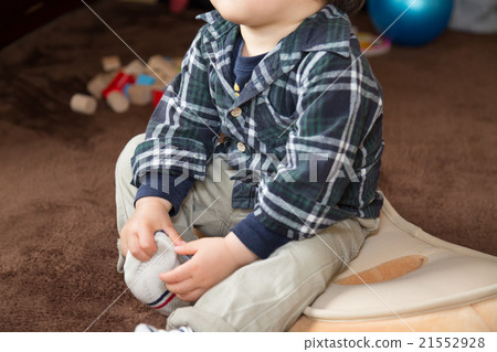 Infant looking at TV Infant looking at TV 21552928
