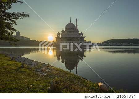 Silhouette mosque during sunrise with reflection 21557384