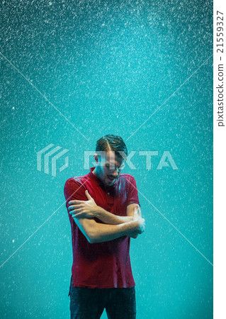 The portrait of young man in the rain The portrait of young man in the rain 21559327