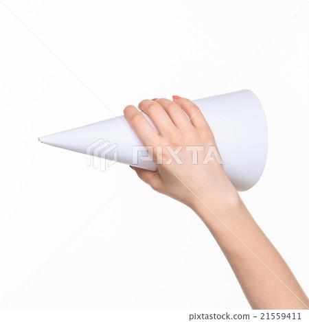 The cone in female hands on white background The cone in female hands on white background 21559411