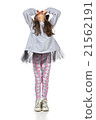 Little brunette girl in fashionable dress posing 21562191