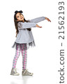 Little brunette girl in fashionable dress posing 21562193