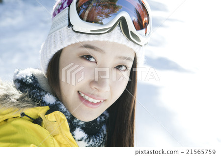 Looking at the camera at snowboardware 21565759