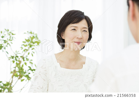 Female in her 50 21566358