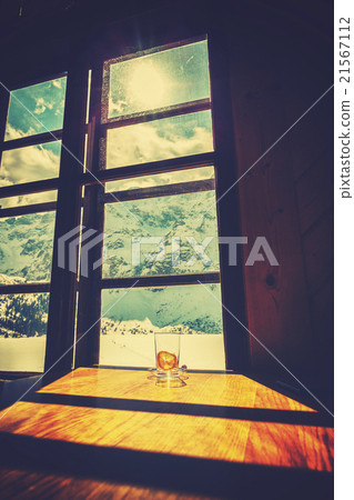 Vintage stylized empty tea glass on wooden table. 21567112