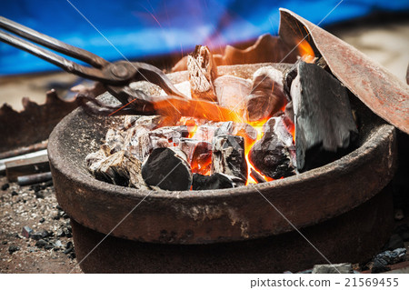 forge a burning forge and tools 21569455