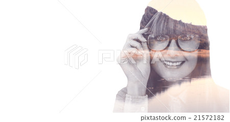 Composite image of smiling hipster woman looking at camera 21572182