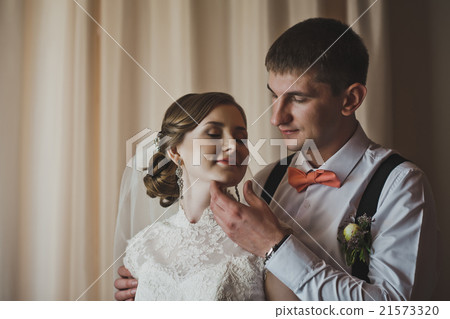The man tenderly embraces his wife 3731. The man tenderly embraces his wife 3731. 21573320