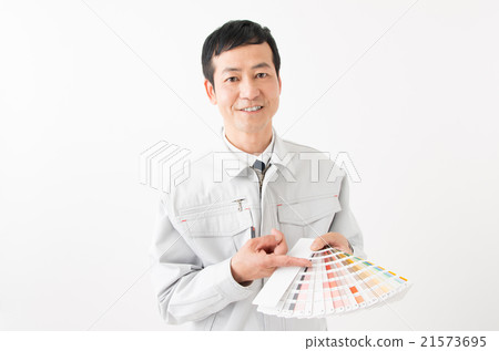 A man with a color swatch book A man with a color swatch book 21573695