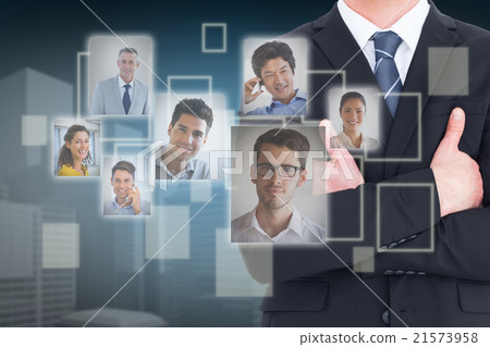 Composite image of mid section of businessman with arms crossed 21573958