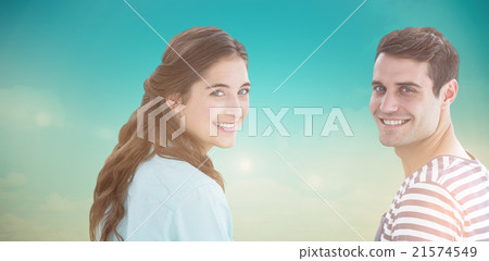 Composite image of couple looking at camera 21574549