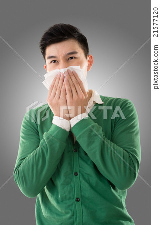 Sneezing asian man Sneezing asian man 21577120