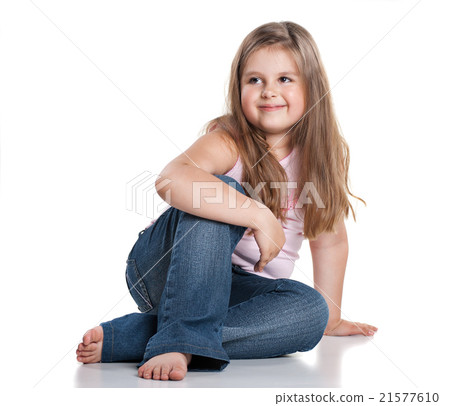 Cute happy little girl sitting on white background 21577610
