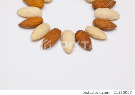 Almond nuts on the white table 21580097