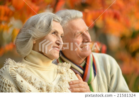 Senior couple in autumn park Senior couple in autumn park 21581324