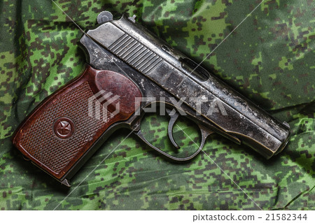 semi-automatic pistol on pixel camouflage 21582344