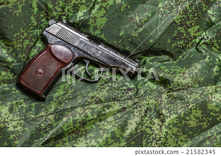 semi-automatic pistol on pixel camouflage 21582345