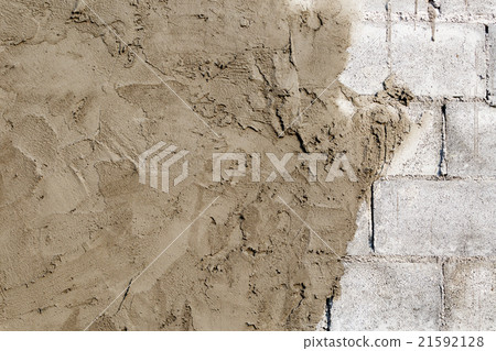 plasterer concrete worker at wall  21592128
