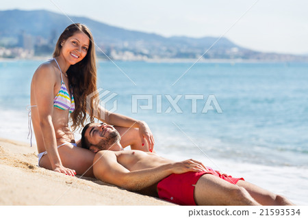 Young couple at sea shore 21593534