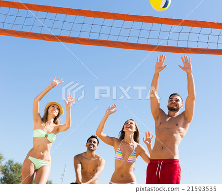 friends playing volleyball 21593535