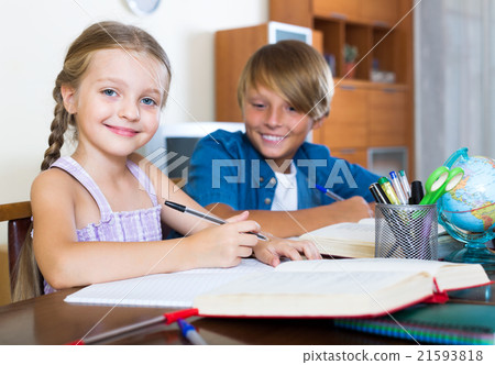 Big brother helping little girl Big brother helping little girl 21593818