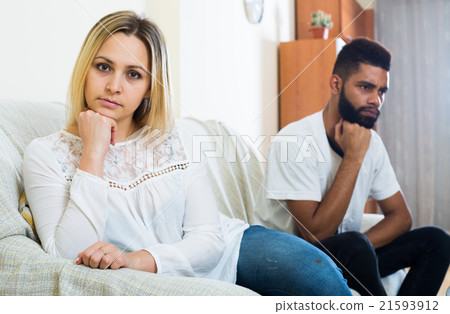 Offended black guy having bad fight with girlfriend and shouting 21593912