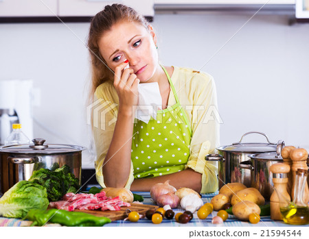 Tired housewife at kitchen Tired housewife at kitchen 21594544