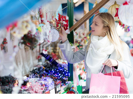 girl shopping at Christmas market 21595095