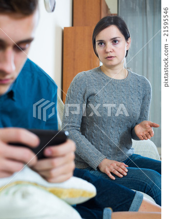 Mother asking for attention of teenager Mother asking for attention of teenager 21595546