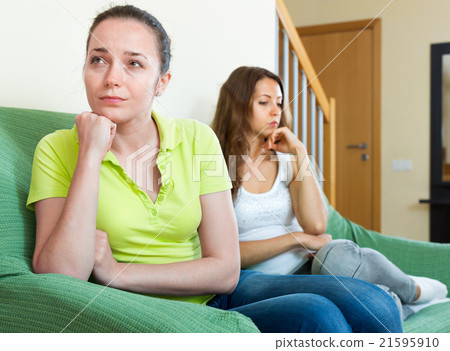 Two young women having quarrel 21595910