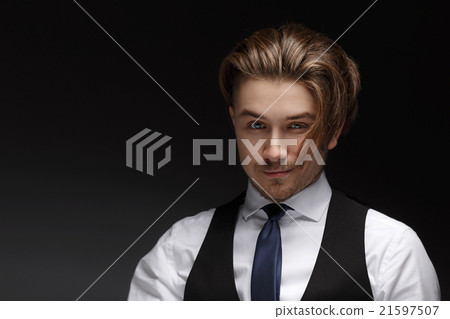 Handsome young gentelman wearing elegant white 21597507