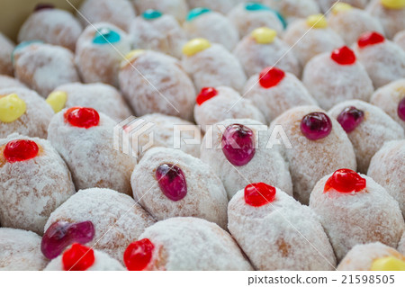 Delicious donuts with icing Delicious donuts with icing 21598505