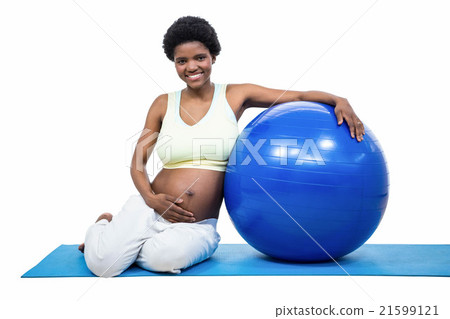 Pregnant woman with exercise ball 21599121