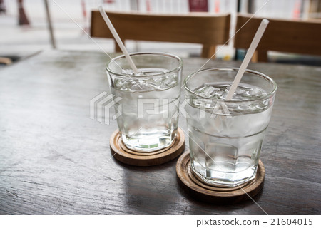 glass of water on a table in a restaurant glass of water on a table in a restaurant 21604015