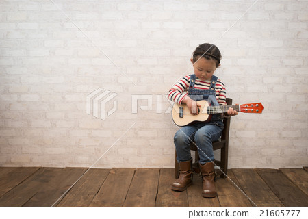 Girl playing guitar Girl playing guitar 21605777
