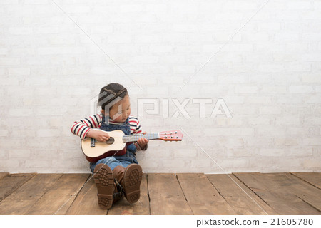 Girl playing guitar Girl playing guitar 21605780