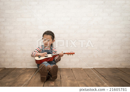 Girl playing guitar Girl playing guitar 21605781